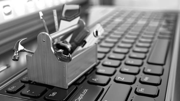 Online support. Toolbox with tools on laptop. 3d Online support. Toolbox with tools on laptop. 3d